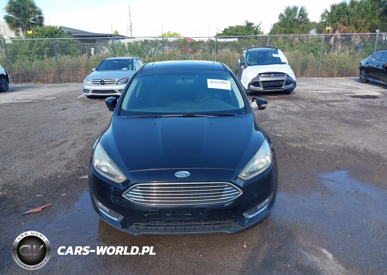 2018 Ford Focus Titanium VIN:1FADP3J20JL324702 - 12