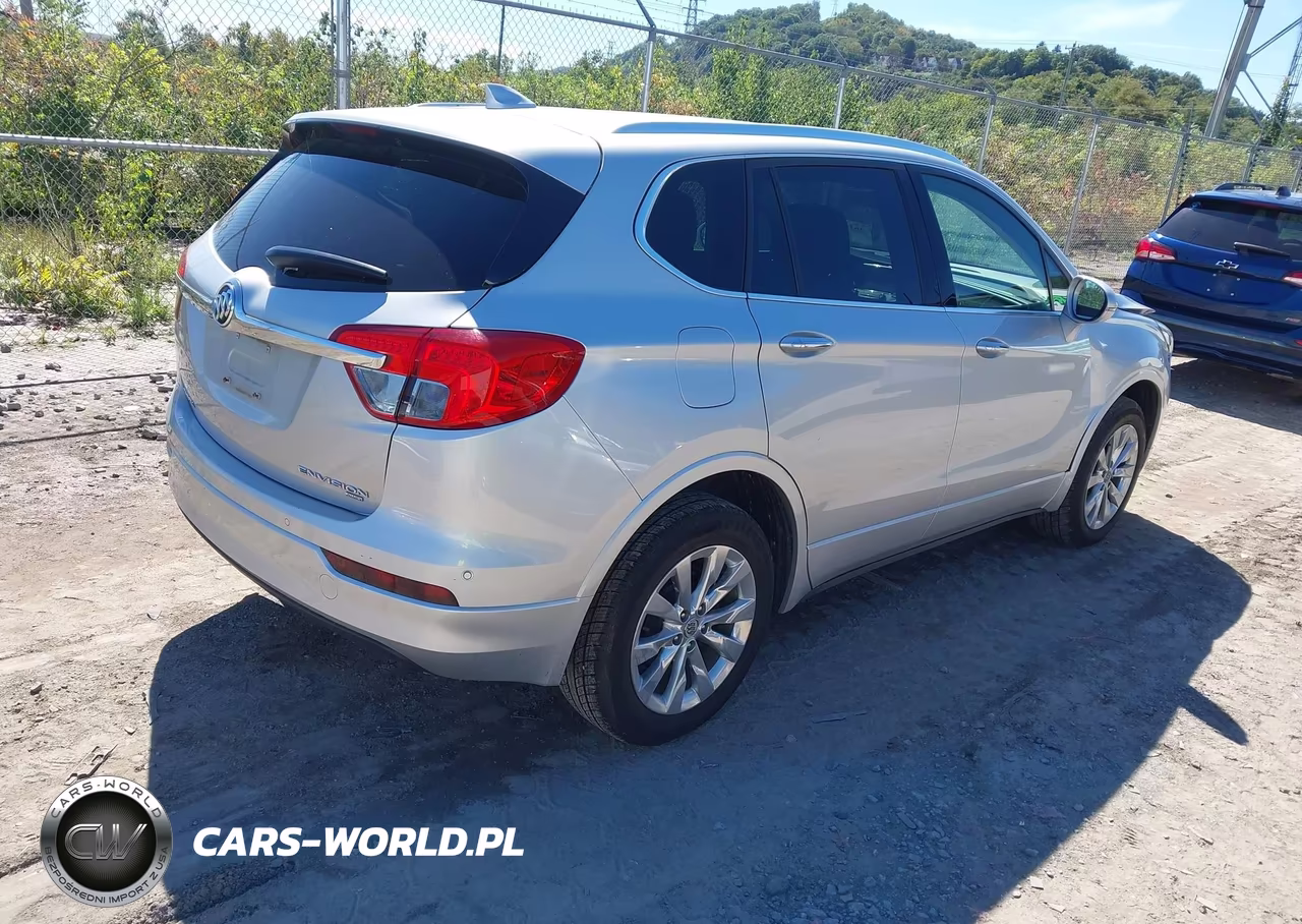 2017 Buick Envision Essence VIN:LRBFXDSAXHD147125 - 4