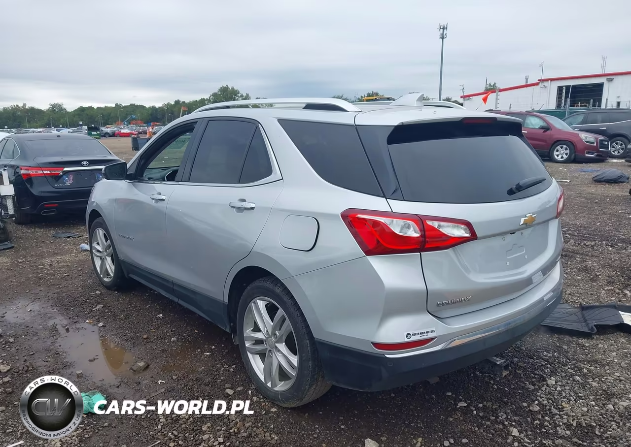 2018 Chevrolet Equinox Premier VIN:3GNAXMEV3JL110497 - 3