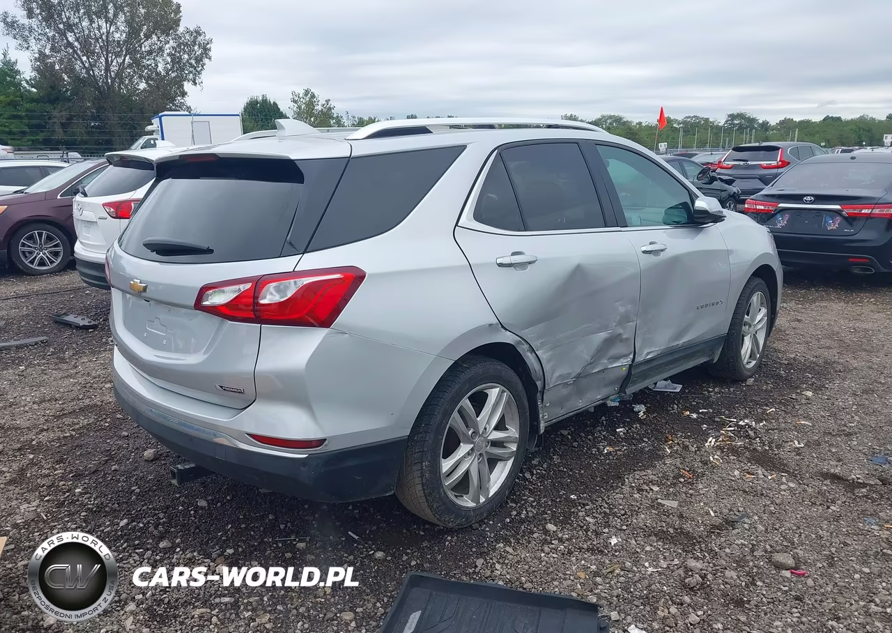 2018 Chevrolet Equinox Premier VIN:3GNAXMEV3JL110497 - 4