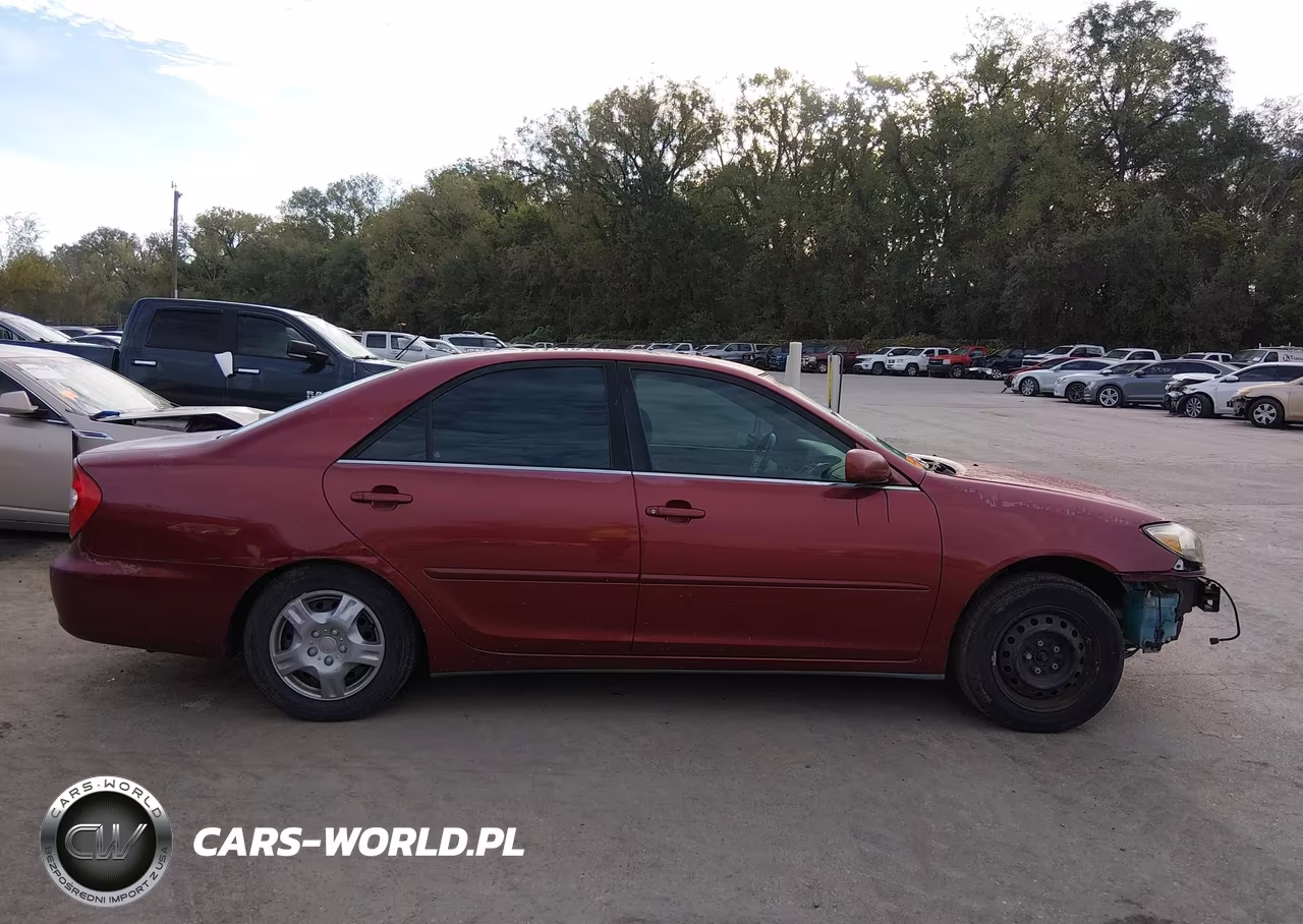 2002 Toyota Camry Le VIN:JTDBE30K220095872 - 14
