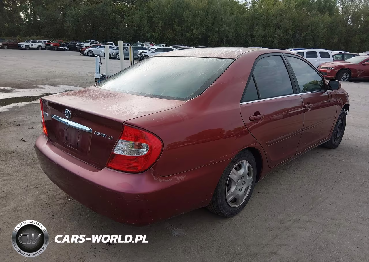 2002 Toyota Camry Le VIN:JTDBE30K220095872 - 4