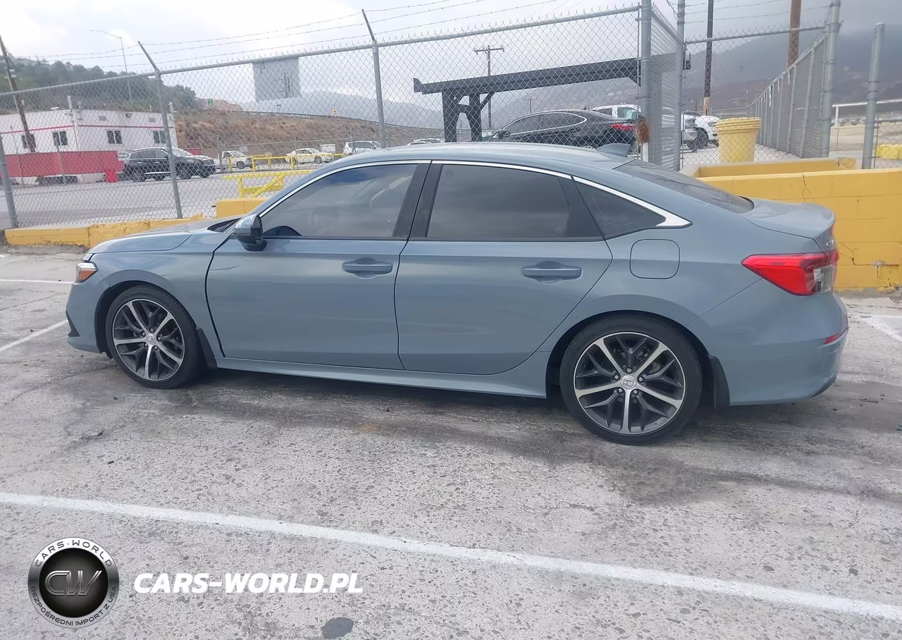 2024 Honda Civic Touring VIN:2HGFE1F95RH304054 - 14