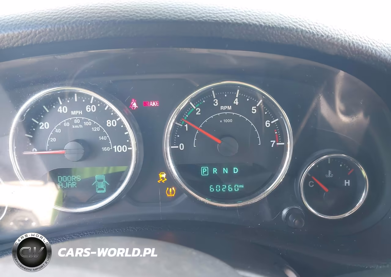 2014 Jeep Wrangler Unlimited Willys Wheeler VIN:1C4BJWDG0EL309747 - 7