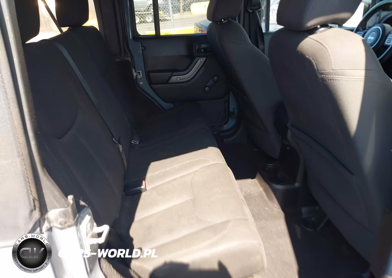 2014 Jeep Wrangler Unlimited Willys Wheeler VIN:1C4BJWDG0EL309747 - 8