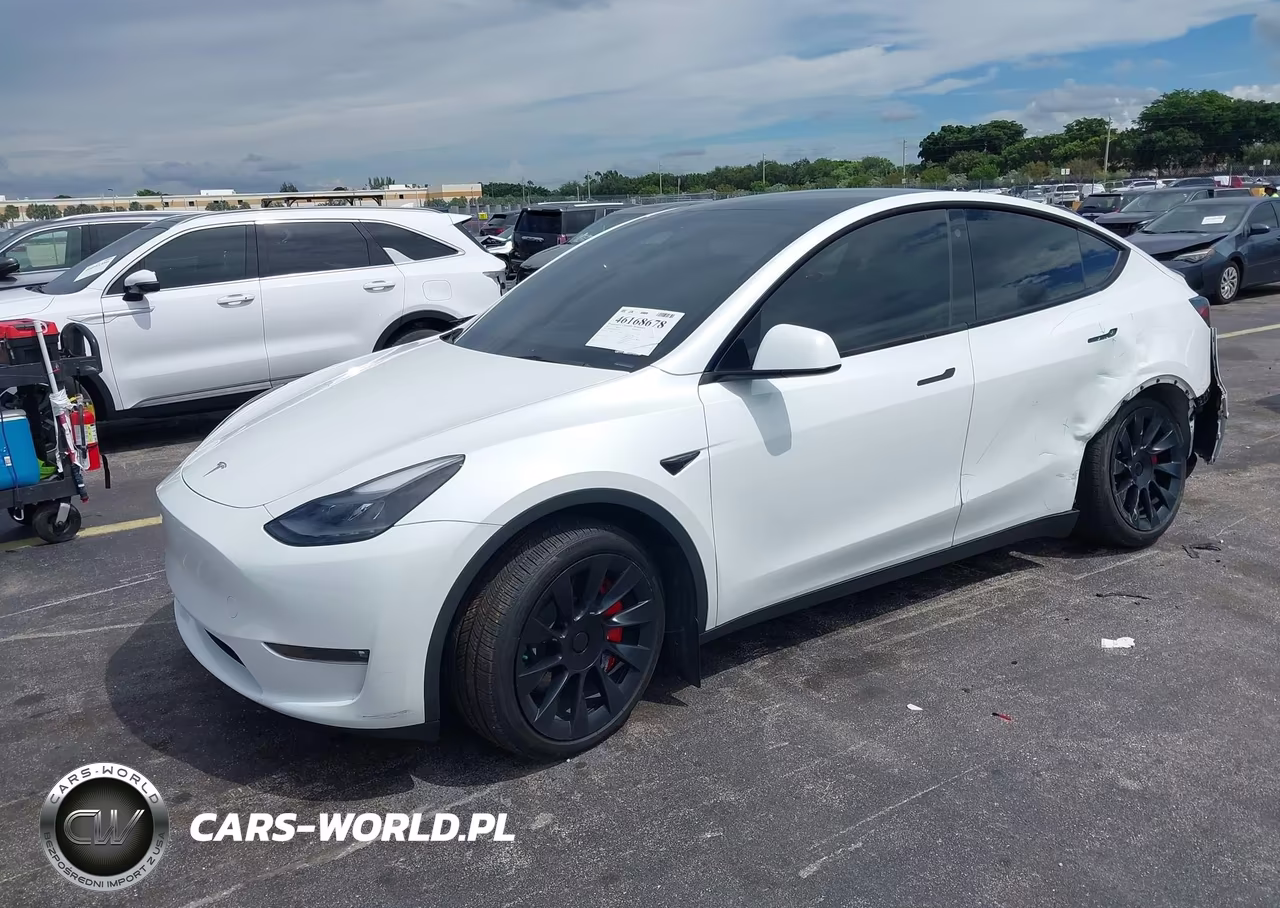 2023 Tesla Model Y Awd-Long Range Dual Motor All-Wheel Drive VIN:7SAYGDEE8PF596502 - 2