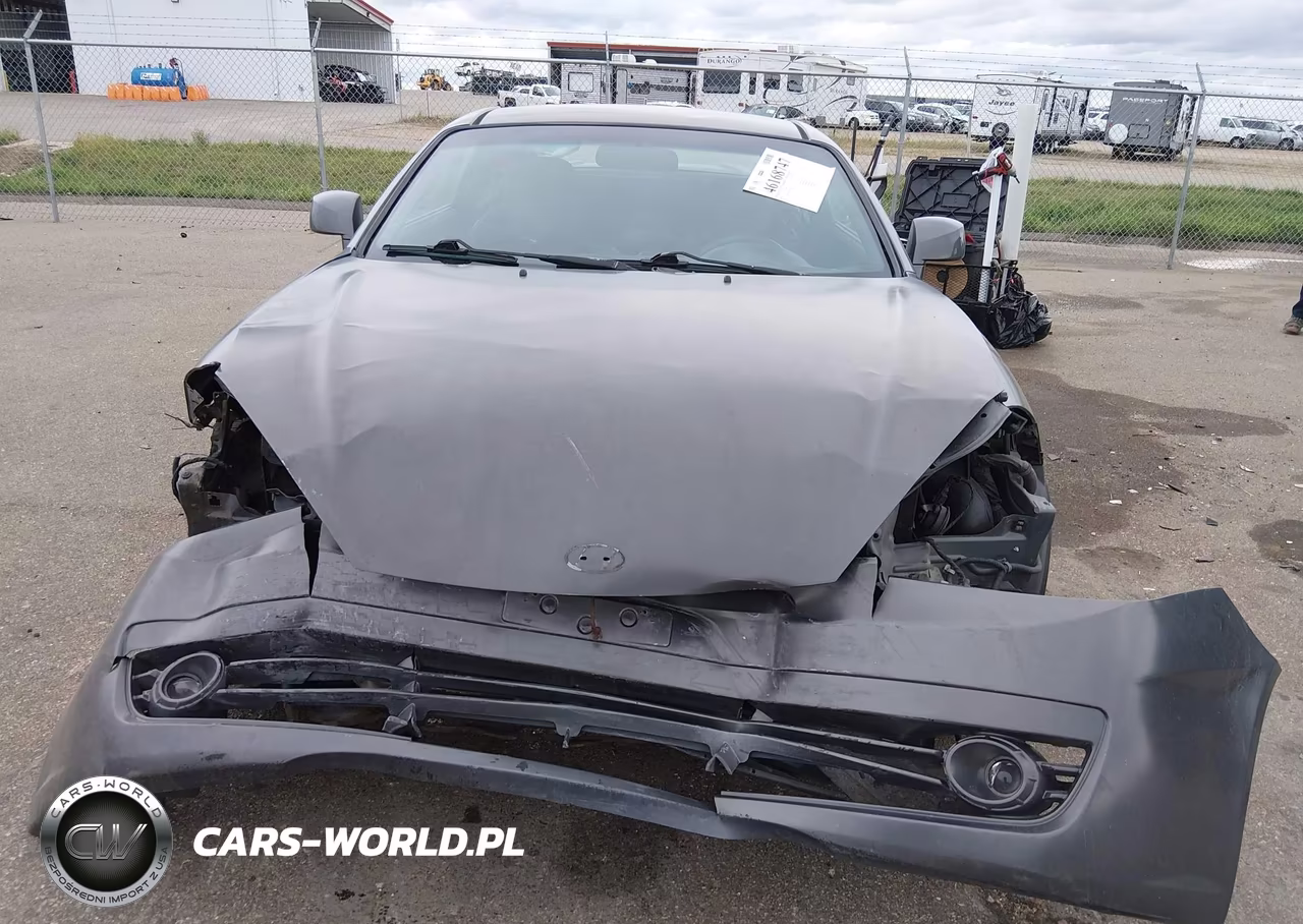 2007 Hyundai Tiburon Gs VIN:KMHHM66D67U260390 - 13