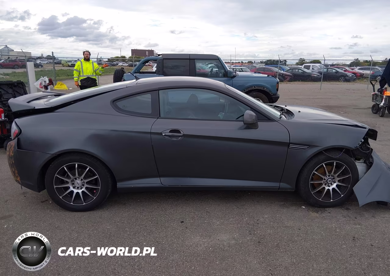 2007 Hyundai Tiburon Gs VIN:KMHHM66D67U260390 - 14