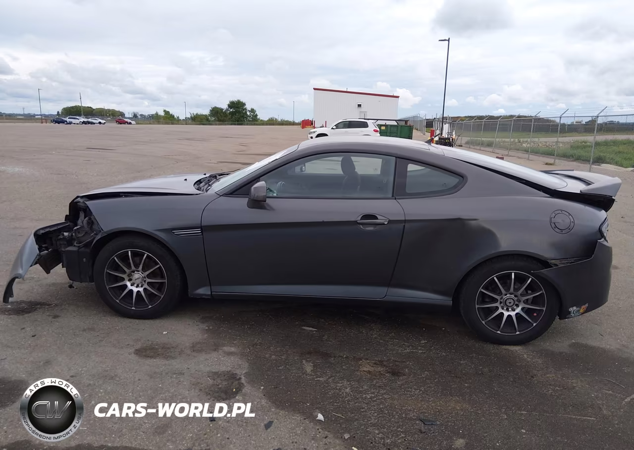 2007 Hyundai Tiburon Gs VIN:KMHHM66D67U260390 - 15