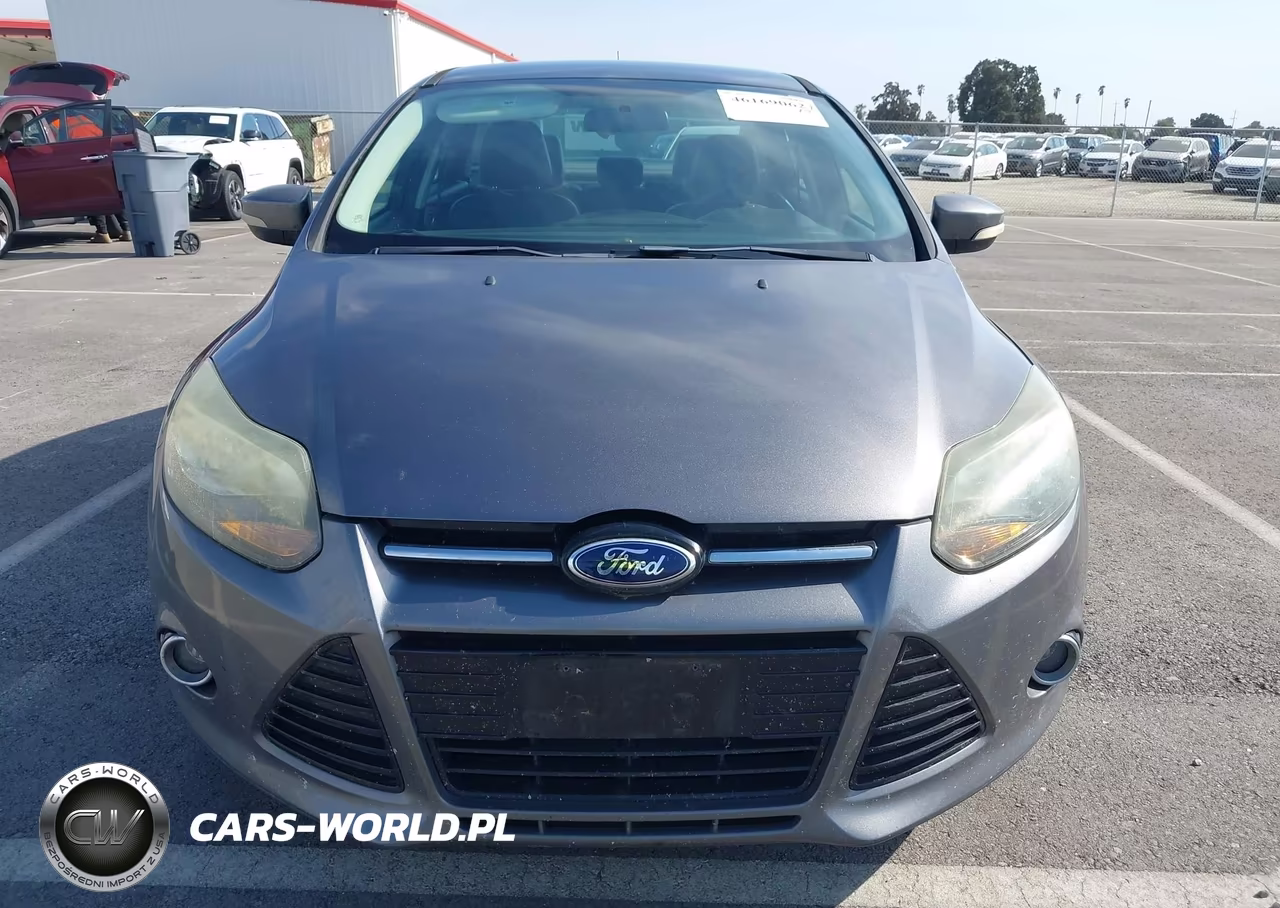 2014 Ford Focus Titanium VIN:1FADP3J20EL382573 - 12