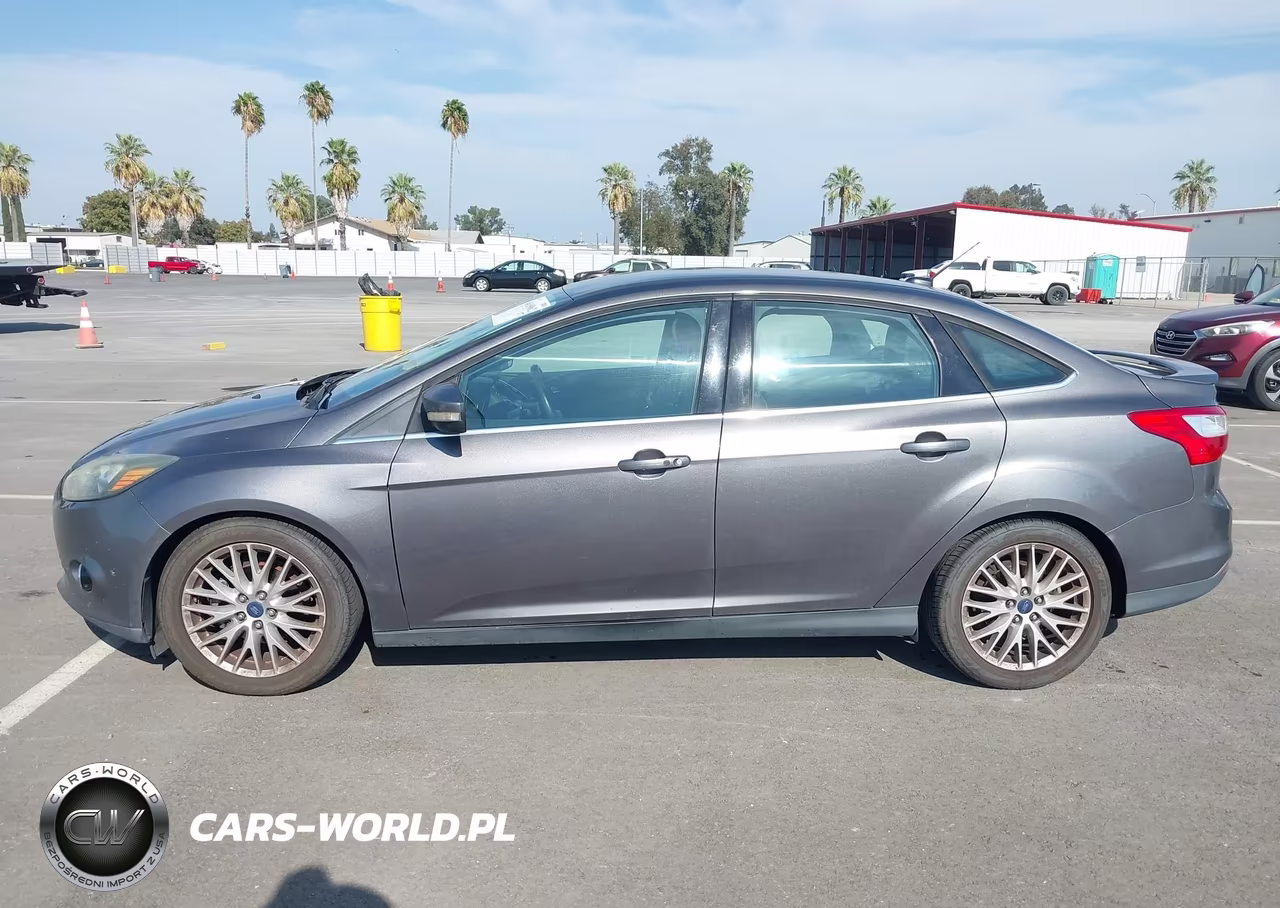 2014 Ford Focus Titanium VIN:1FADP3J20EL382573 - 14