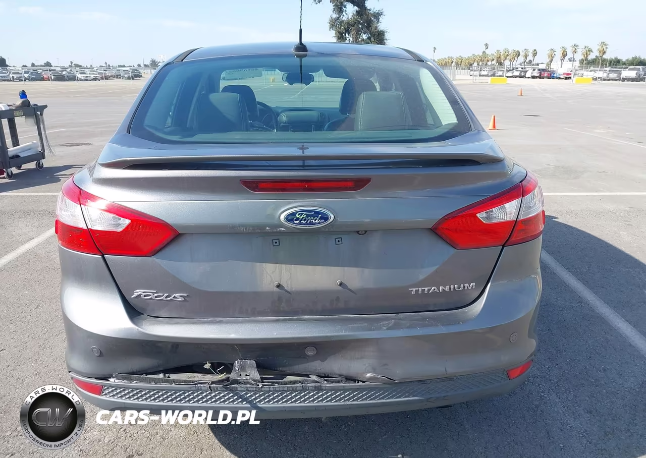 2014 Ford Focus Titanium VIN:1FADP3J20EL382573 - 16