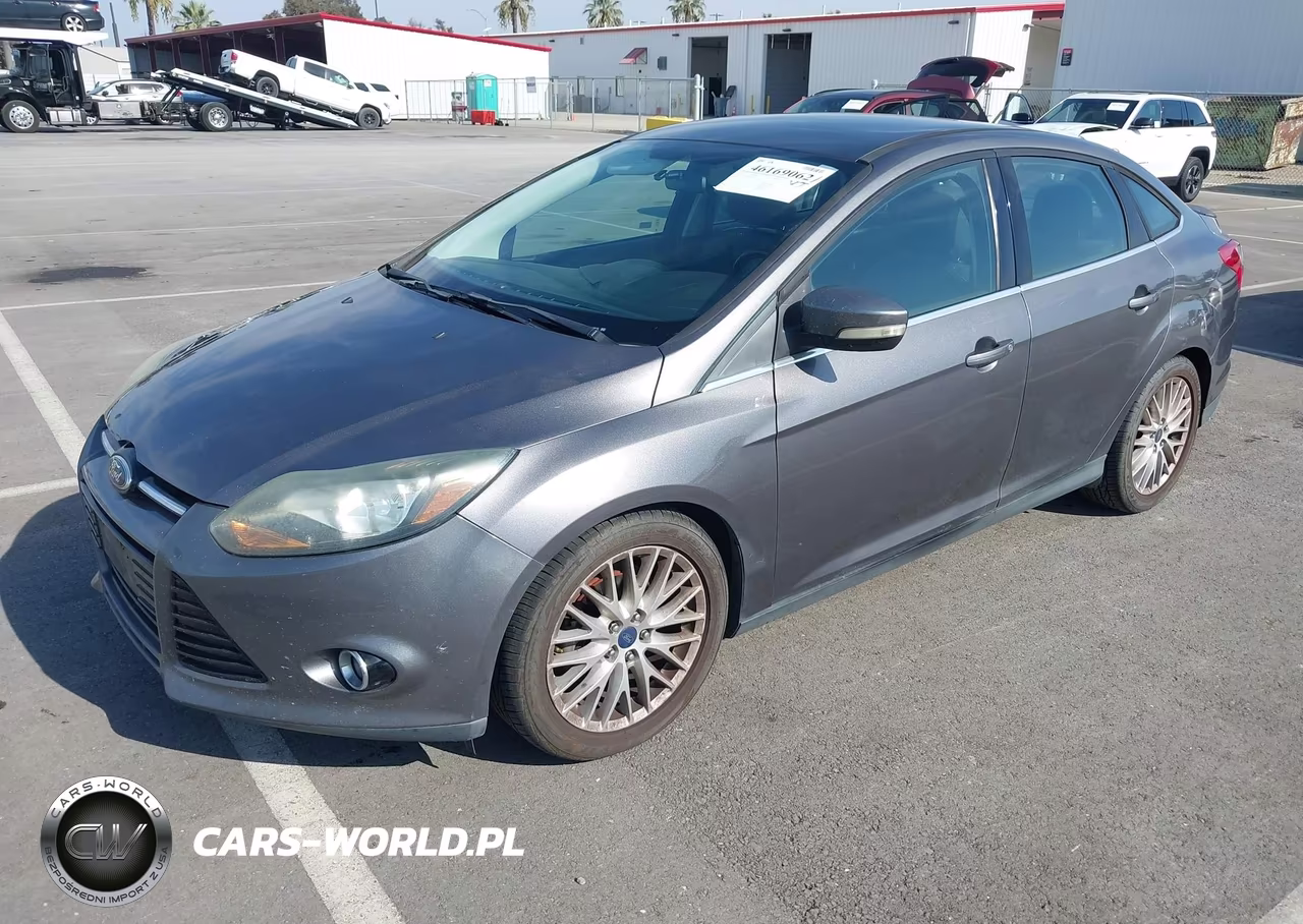 2014 Ford Focus Titanium VIN:1FADP3J20EL382573 - 2