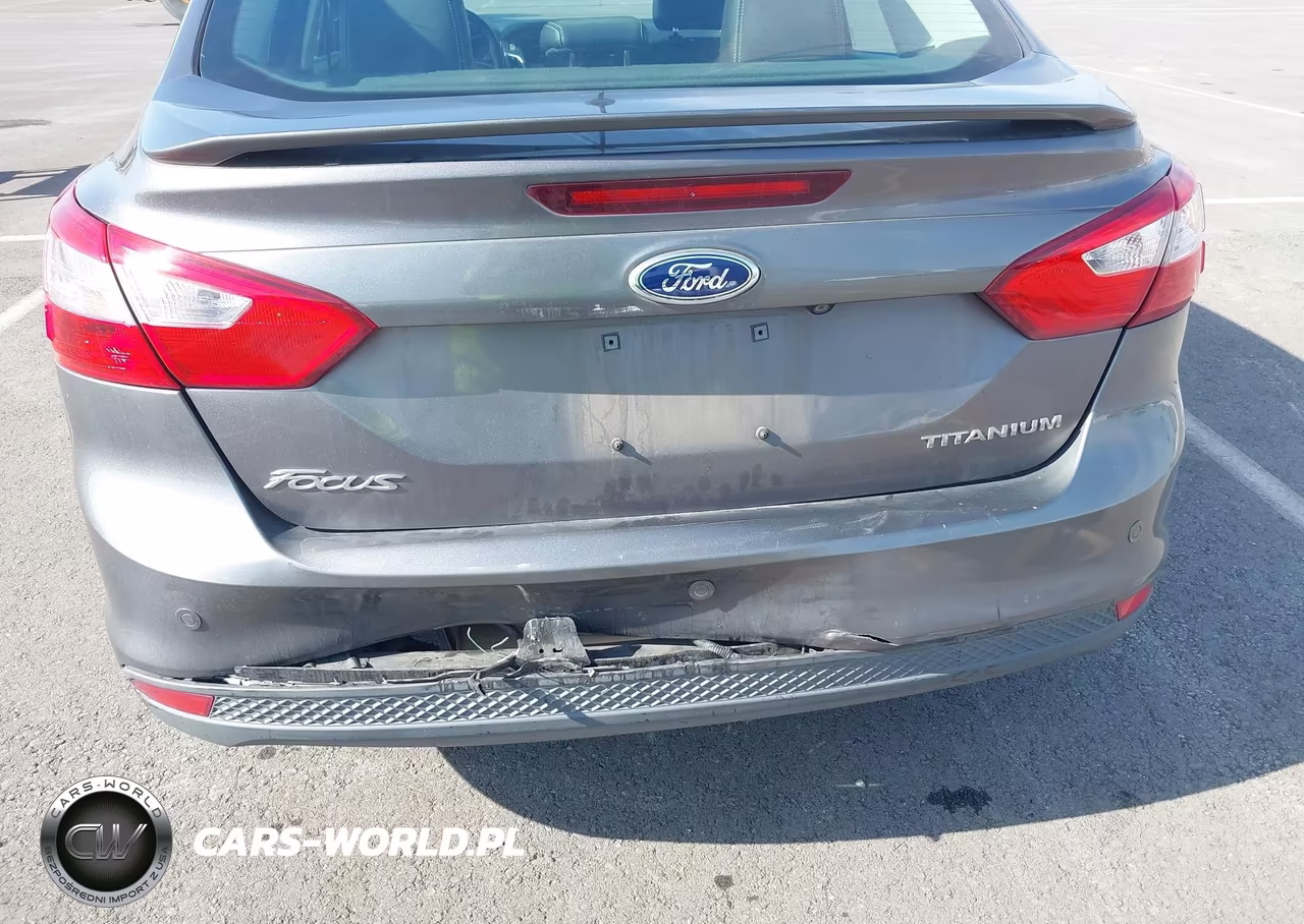 2014 Ford Focus Titanium VIN:1FADP3J20EL382573 - 6
