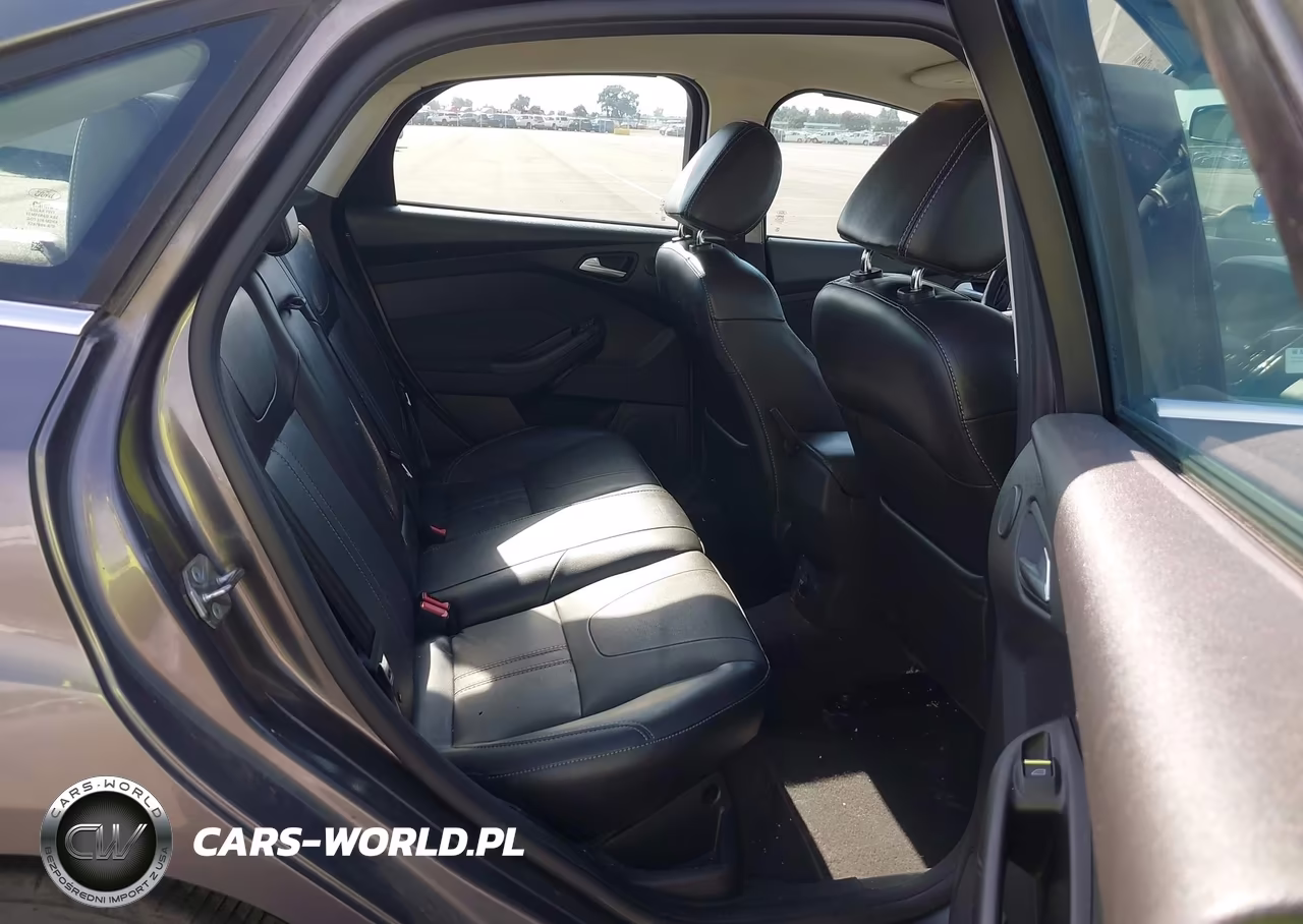 2014 Ford Focus Titanium VIN:1FADP3J20EL382573 - 8