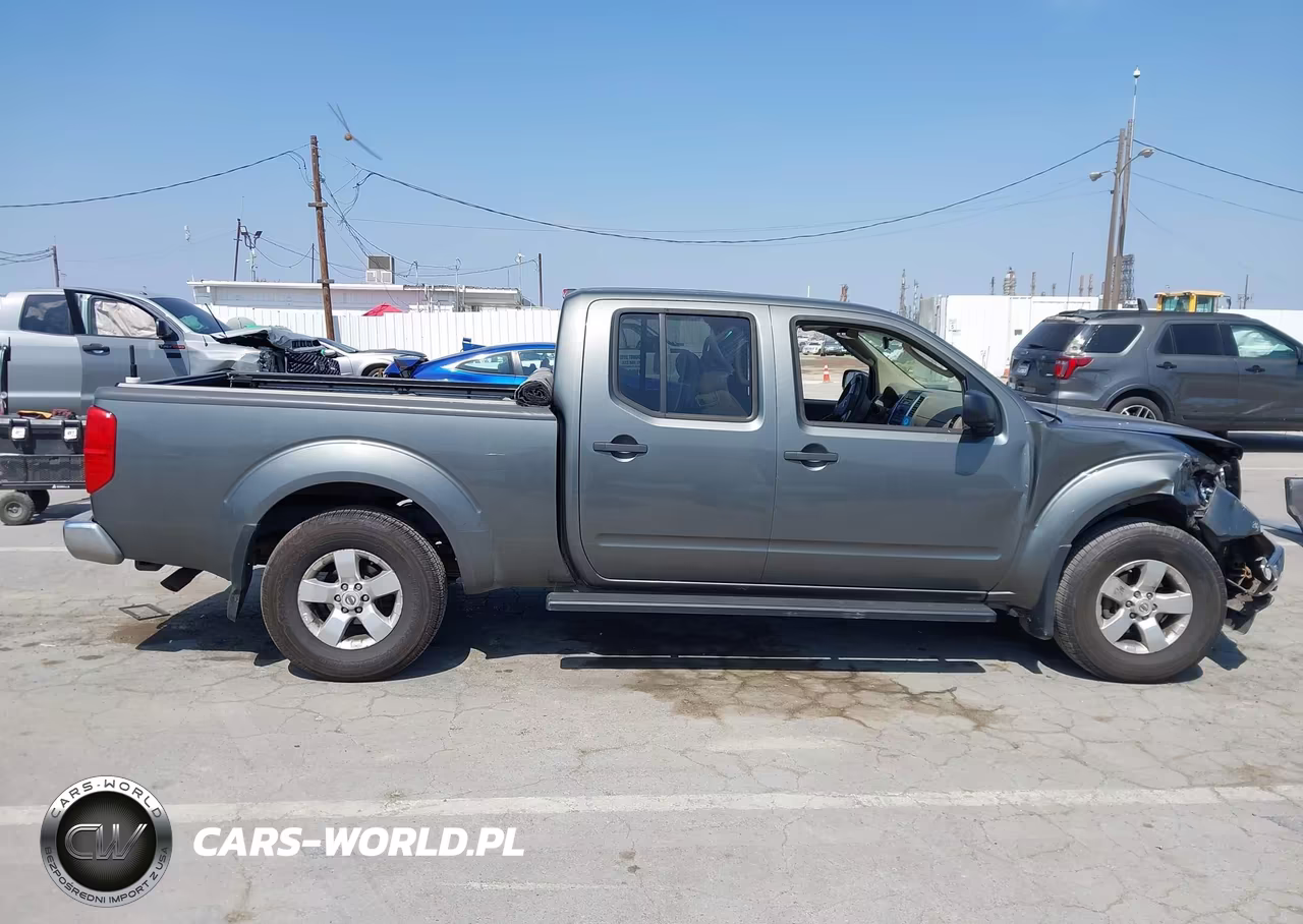 2009 Nissan Frontier Le VIN:1N6AD09W69C427062 - 13