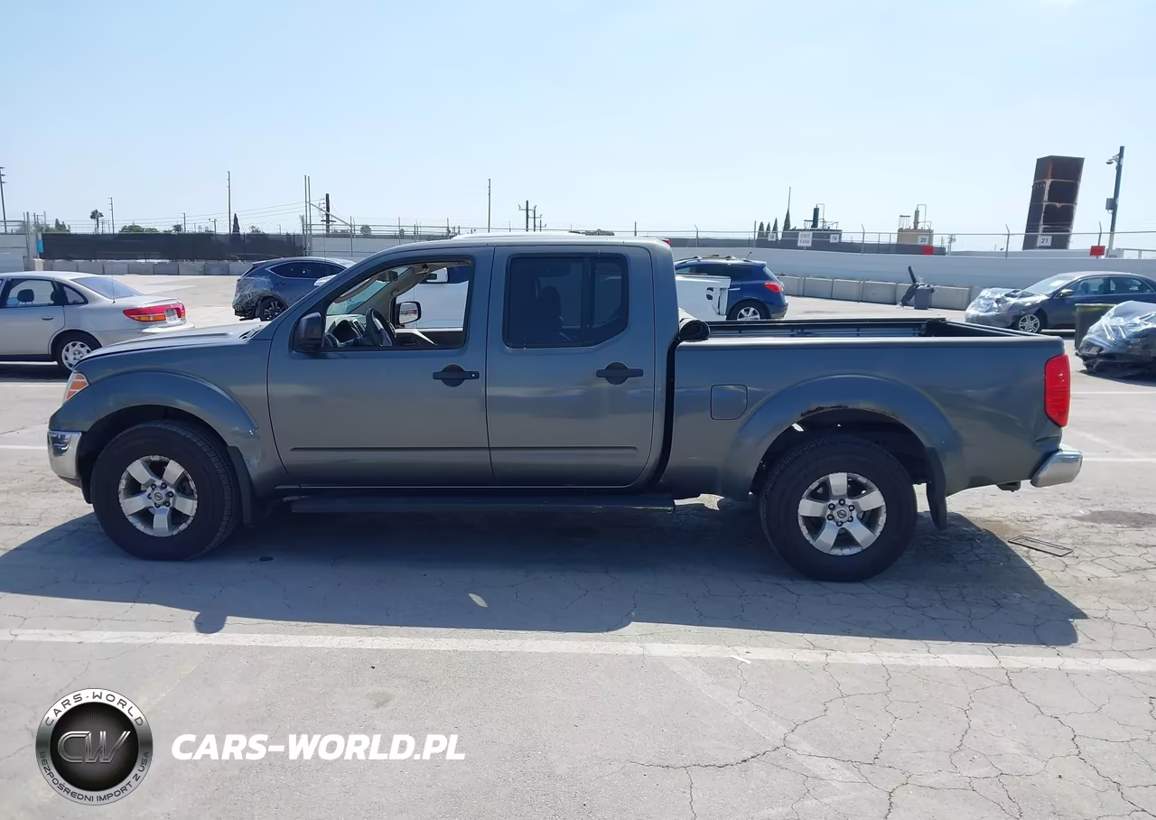 2009 Nissan Frontier Le VIN:1N6AD09W69C427062 - 14