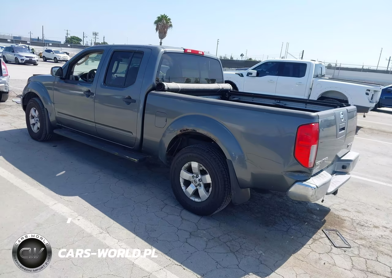 2009 Nissan Frontier Le VIN:1N6AD09W69C427062 - 3