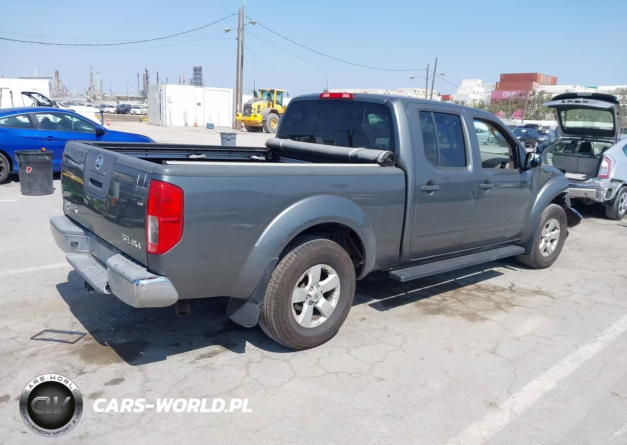 2009 Nissan Frontier Le VIN:1N6AD09W69C427062 - 4