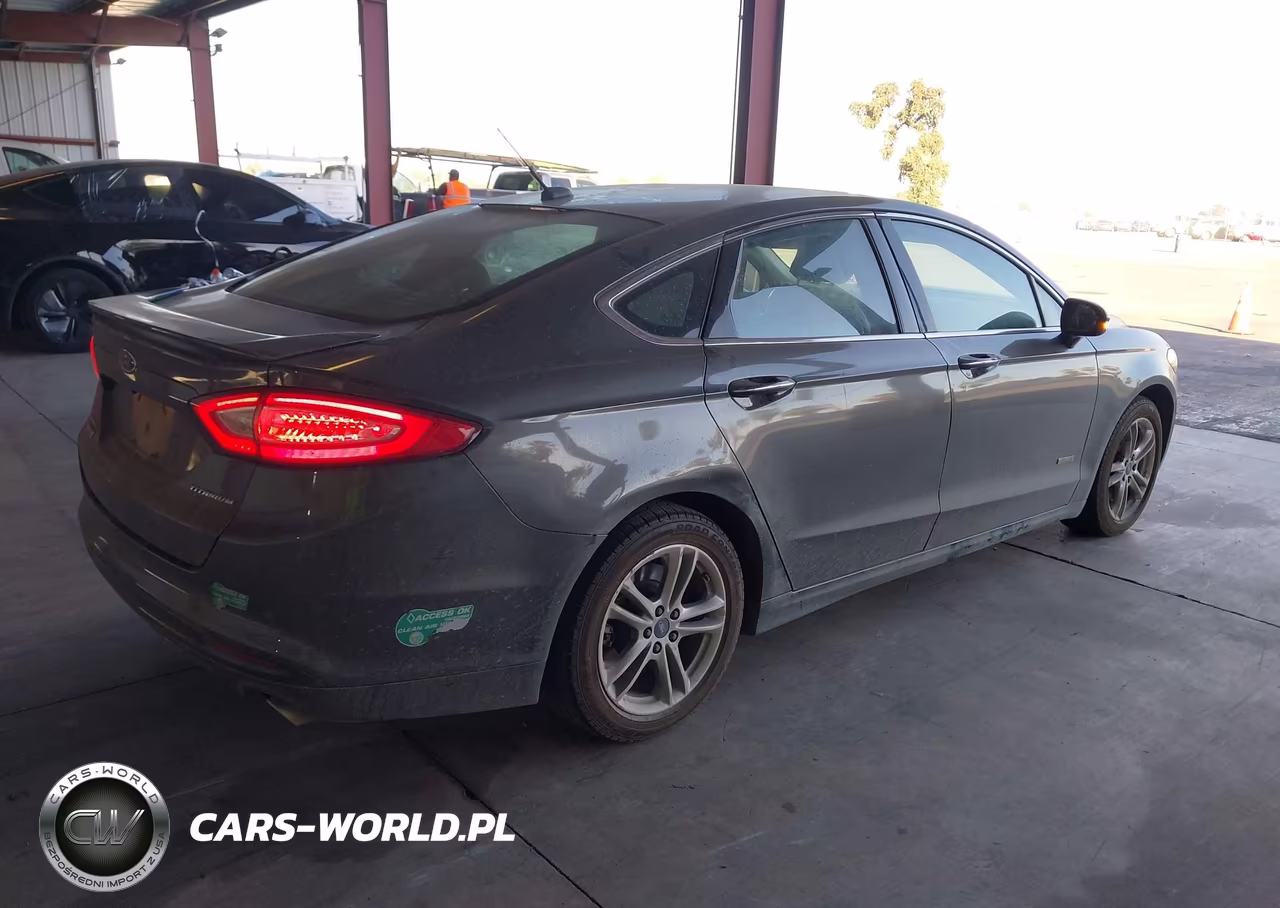 2015 Ford Fusion Energi Titanium VIN:3FA6P0SU0FR170489 - 4