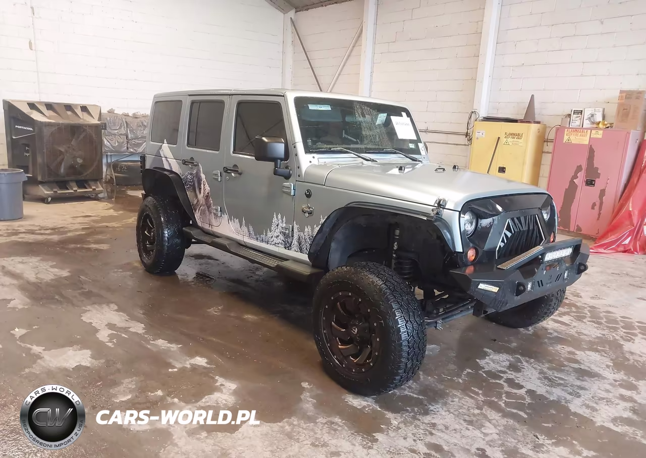 2012 Jeep Wrangler Unlimited Sahara VIN:1C4BJWEG9CL148651 - 1
