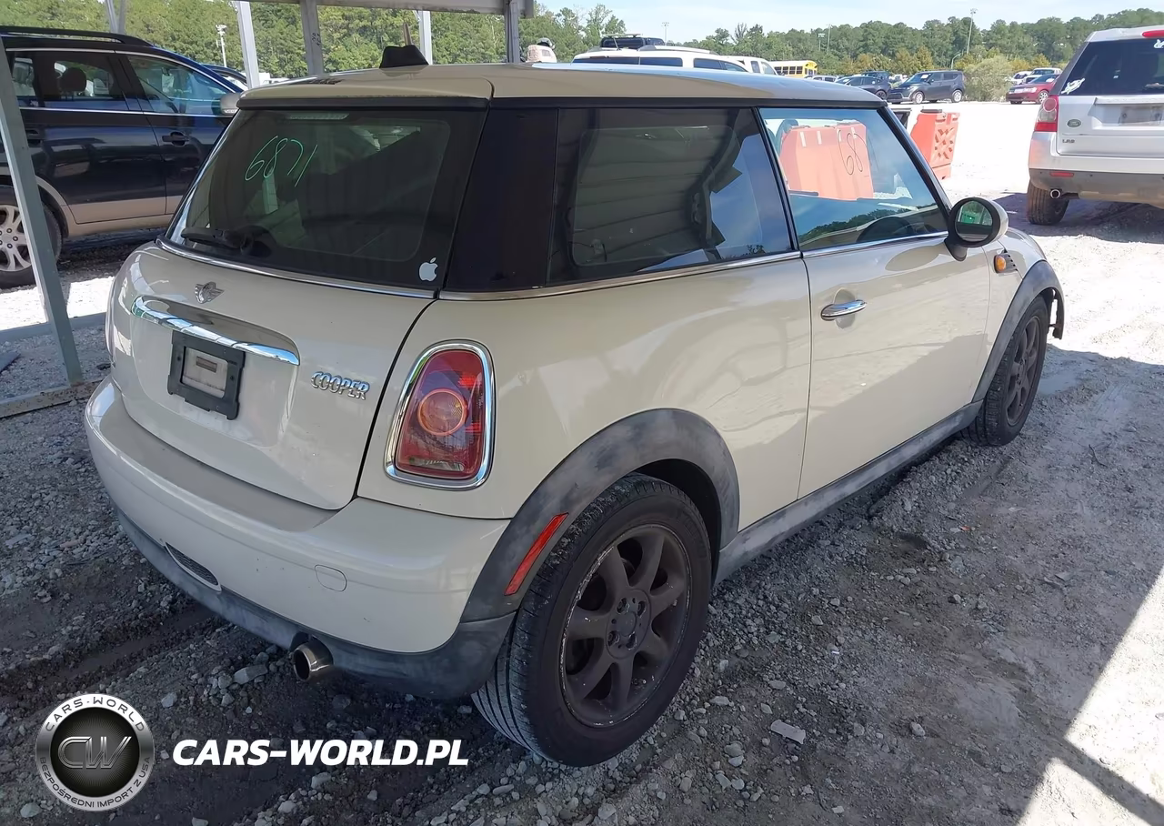 2009 Mini Cooper VIN:WMWMF33559TW76493 - 4