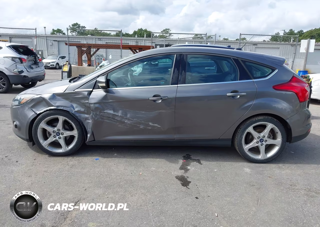 2012 Ford Focus Titanium VIN:1FAHP3N28CL460395 - 14