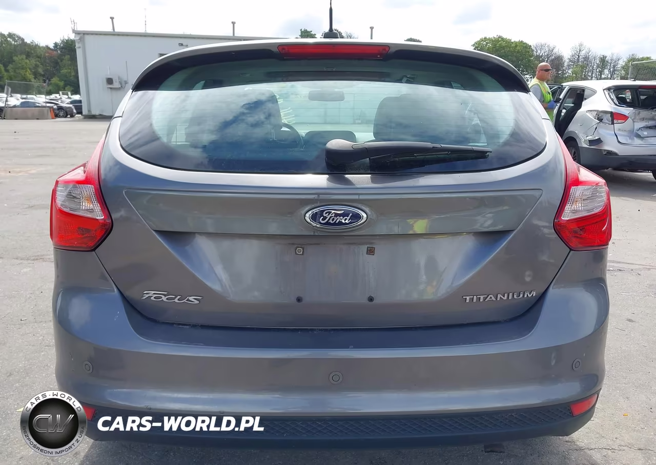 2012 Ford Focus Titanium VIN:1FAHP3N28CL460395 - 16