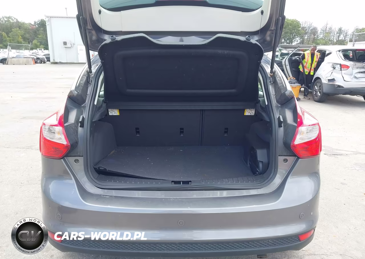 2012 Ford Focus Titanium VIN:1FAHP3N28CL460395 - 18