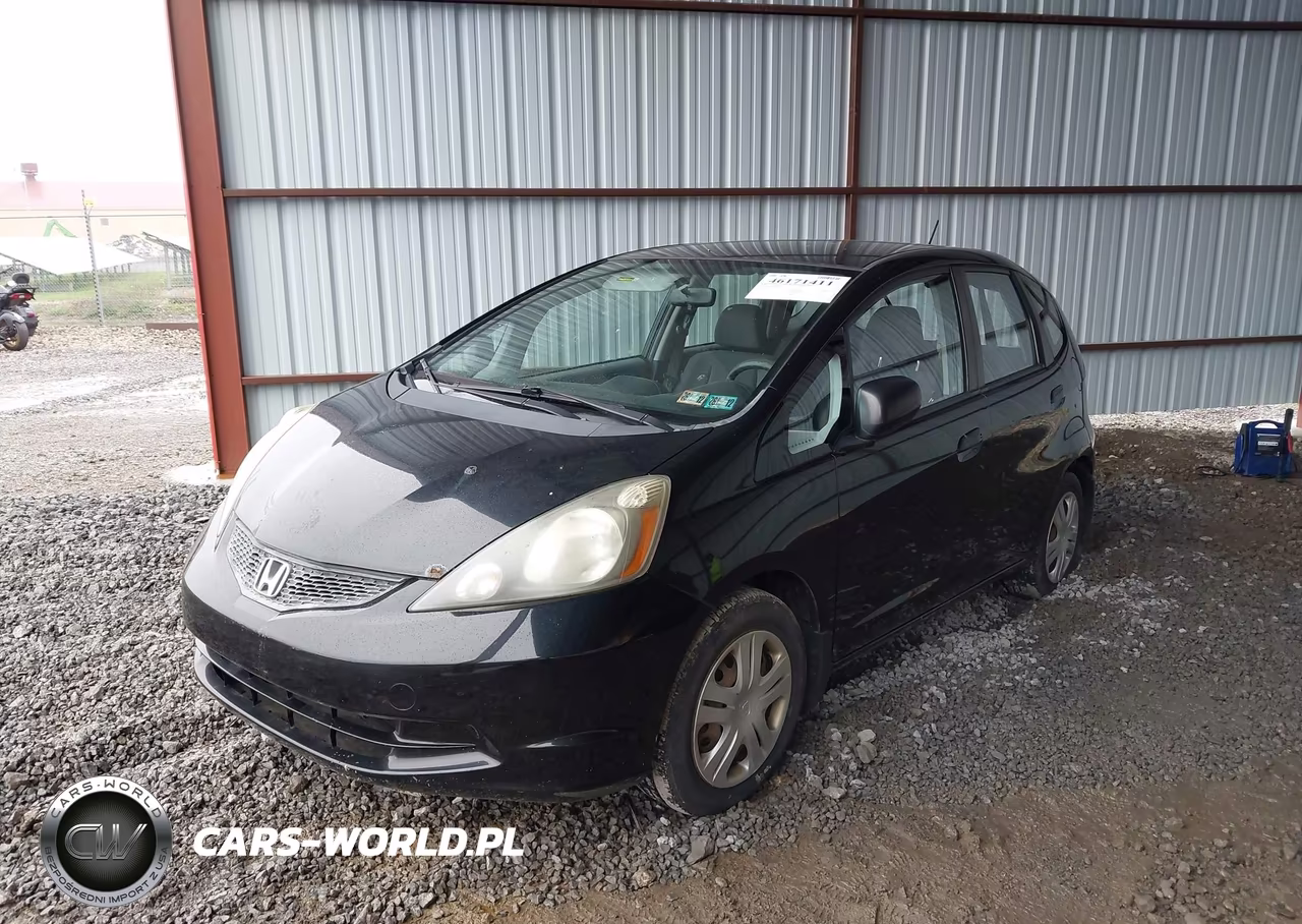2009 Honda Fit VIN:JHMGE87299S061093 - 2