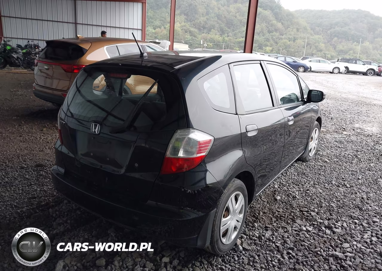 2009 Honda Fit VIN:JHMGE87299S061093 - 4