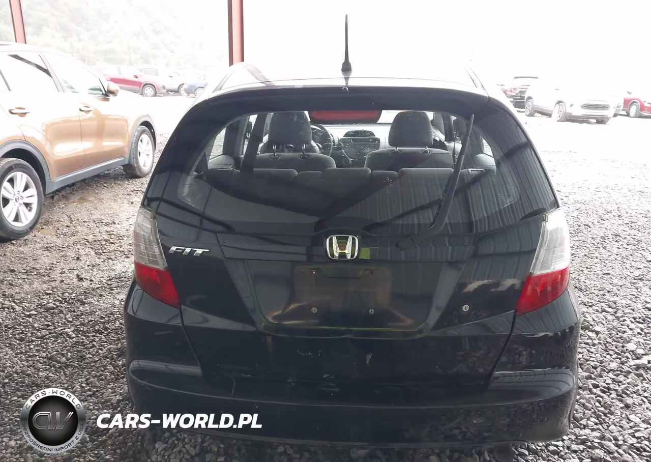 2009 Honda Fit VIN:JHMGE87299S061093 - 6
