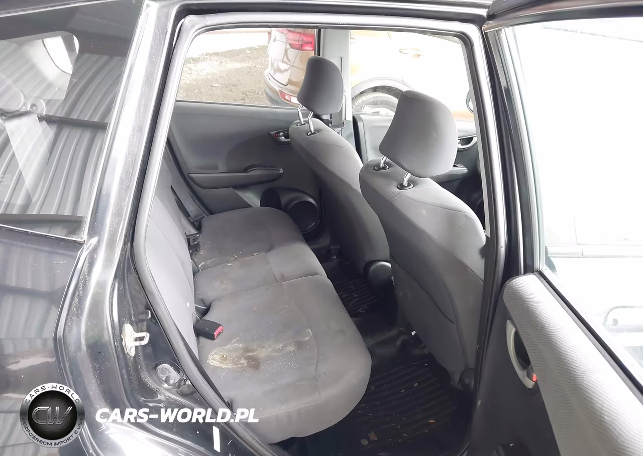 2009 Honda Fit VIN:JHMGE87299S061093 - 8