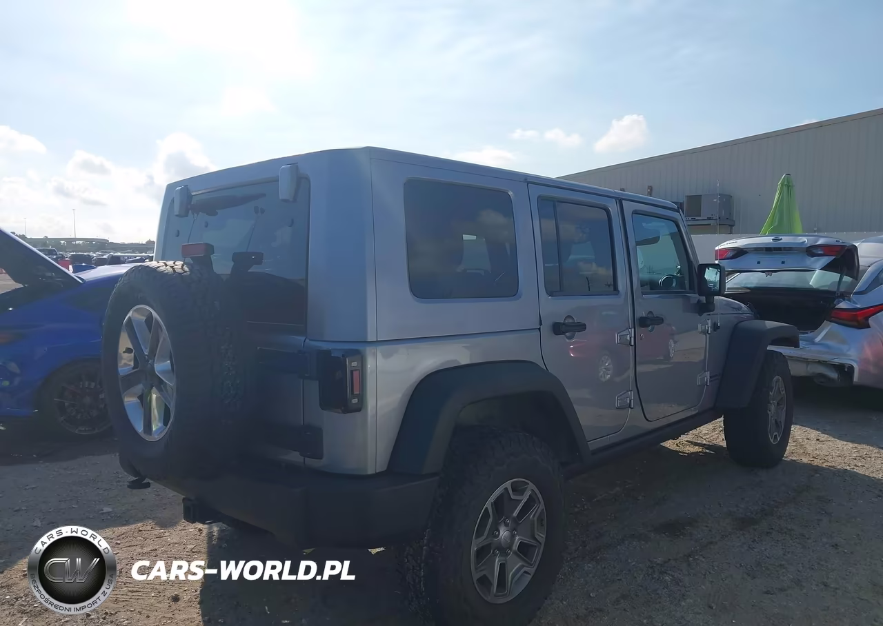 2014 Jeep Wrangler Unlimited Rubicon VIN:1C4BJWFG4EL292142 - 4