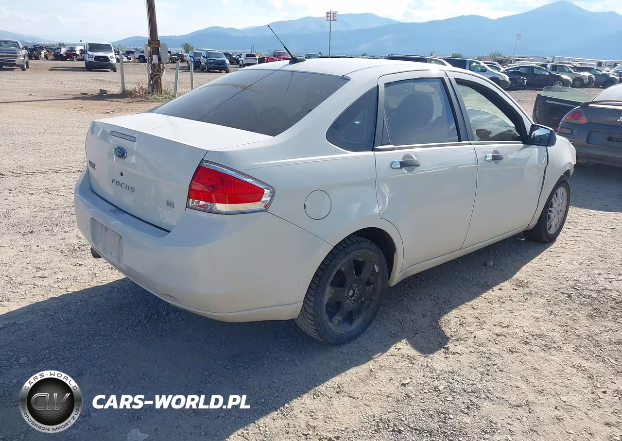 2009 Ford Focus Se VIN:1FAHP35N09W236877 - 4