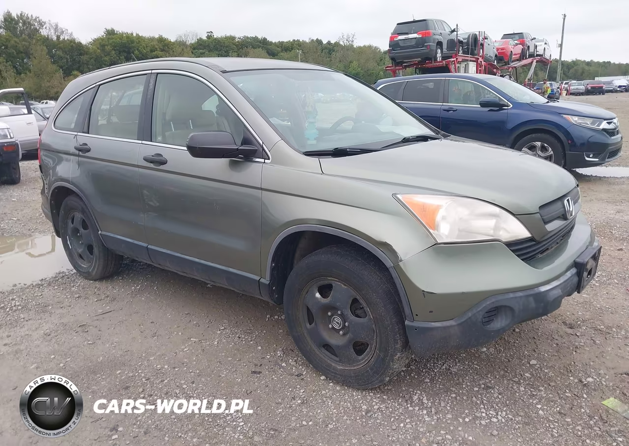 2009 Honda Cr-V Lx VIN:JHLRE38399C009884 - 1