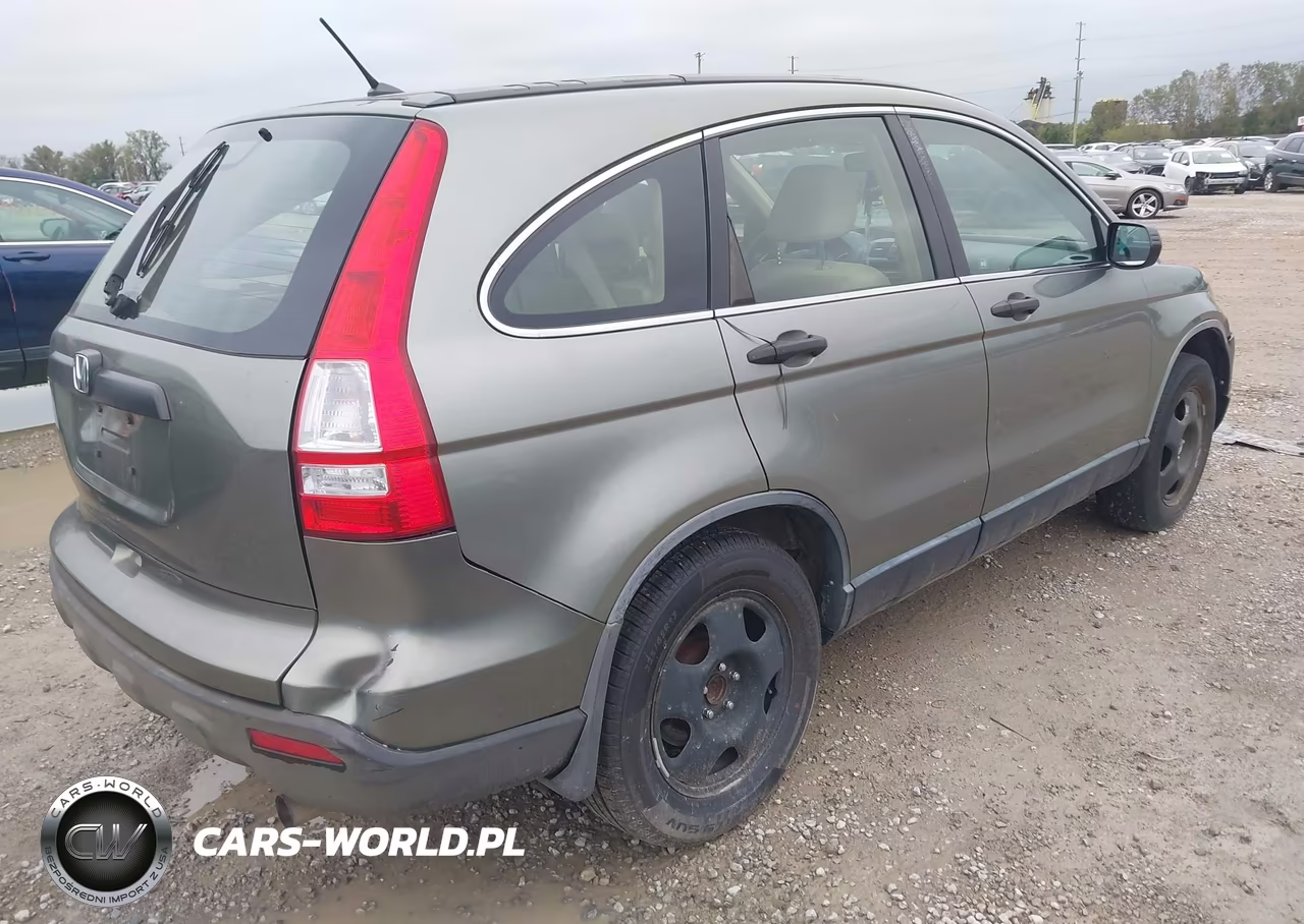 2009 Honda Cr-V Lx VIN:JHLRE38399C009884 - 4