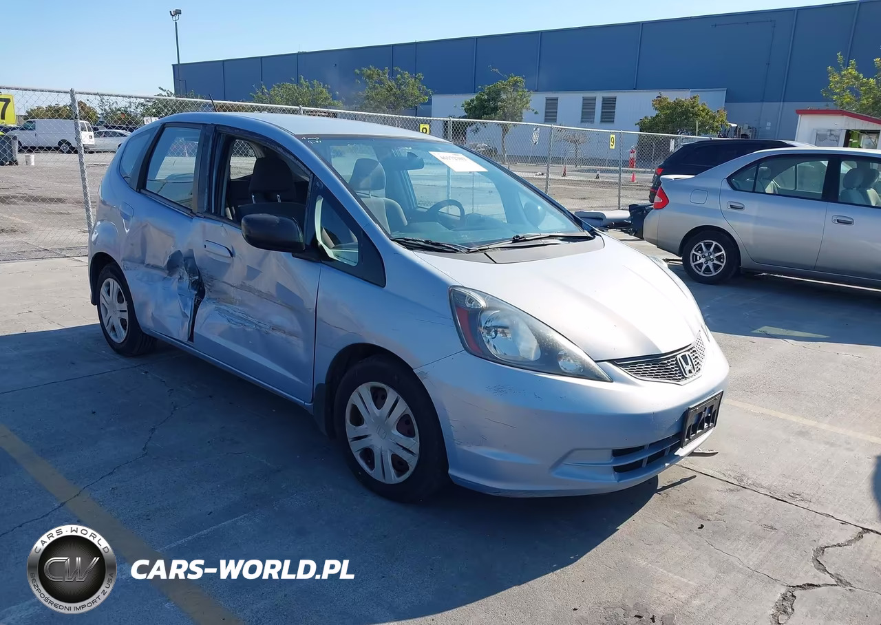 2009 Honda Fit VIN:JHMGE88249S056642 - 1