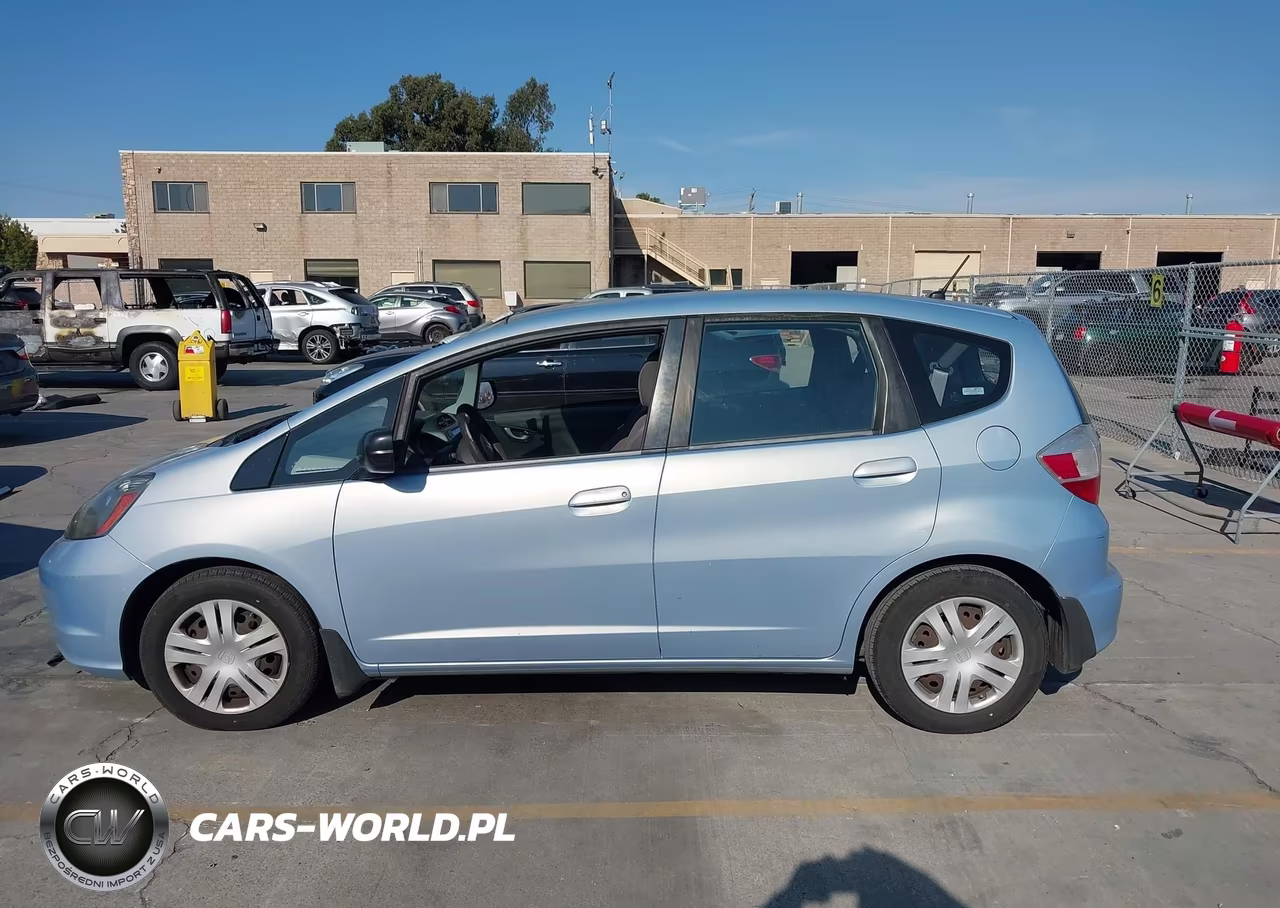 2009 Honda Fit VIN:JHMGE88249S056642 - 14