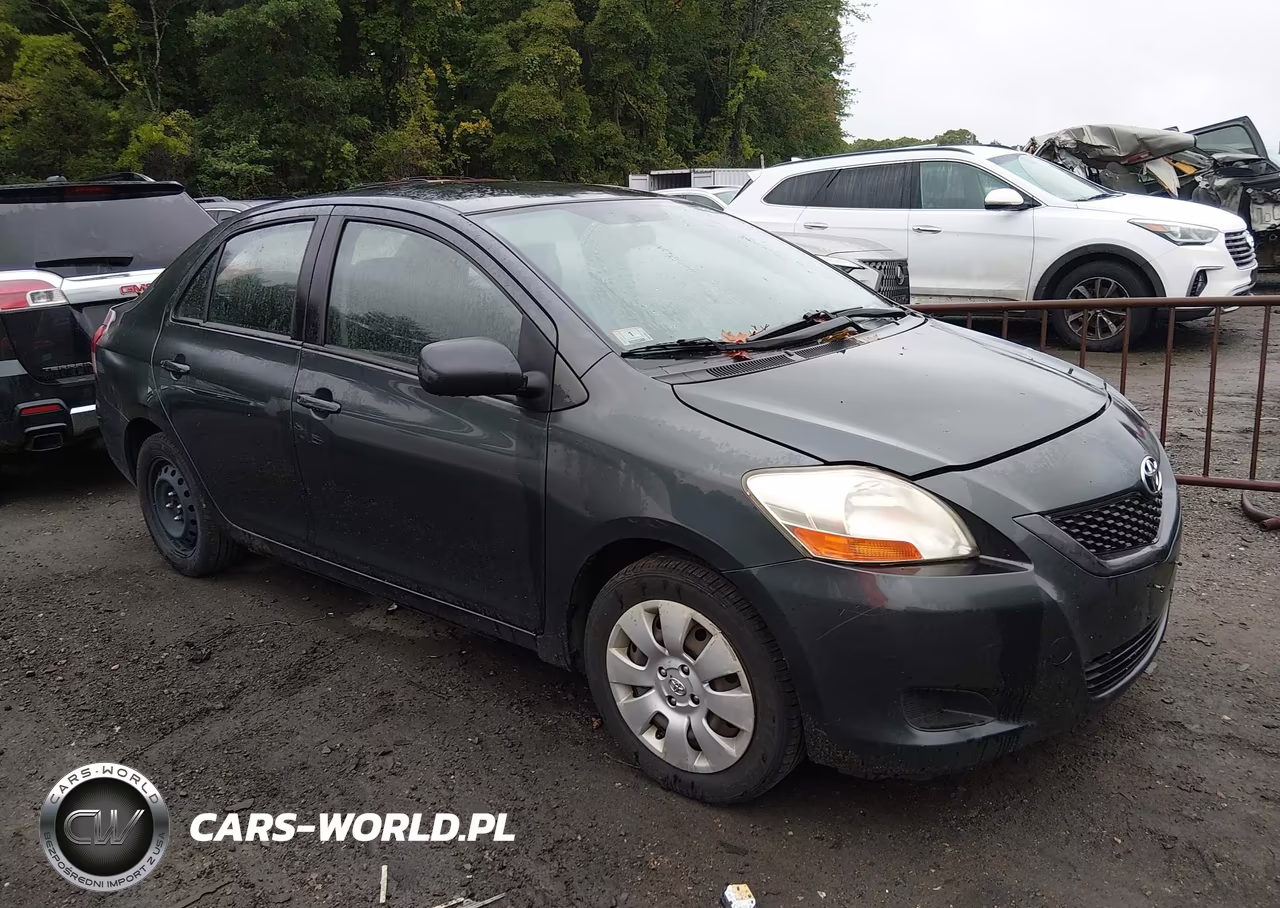 2009 Toyota Yaris VIN:JTDBT903594060389 - 1