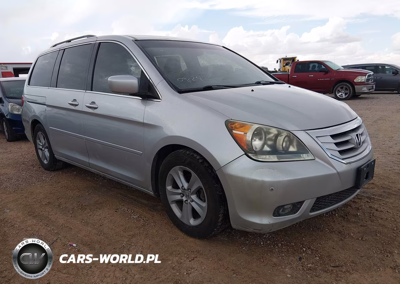 2010 Honda Odyssey Touring VIN:5FNRL3H96AB113473 - 1