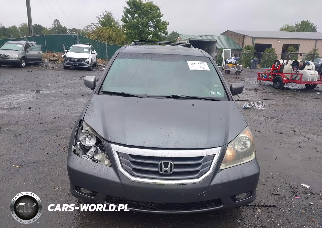 2010 Honda Odyssey Touring VIN:5FNRL3H91AB081676 - 12