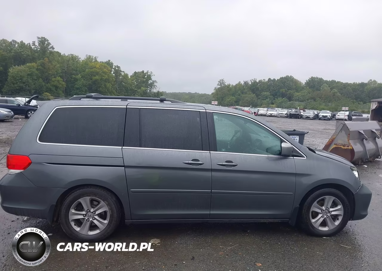 2010 Honda Odyssey Touring VIN:5FNRL3H91AB081676 - 13