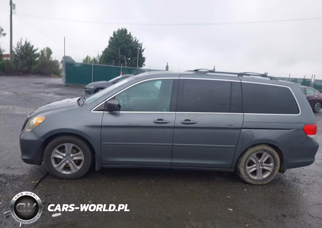 2010 Honda Odyssey Touring VIN:5FNRL3H91AB081676 - 14