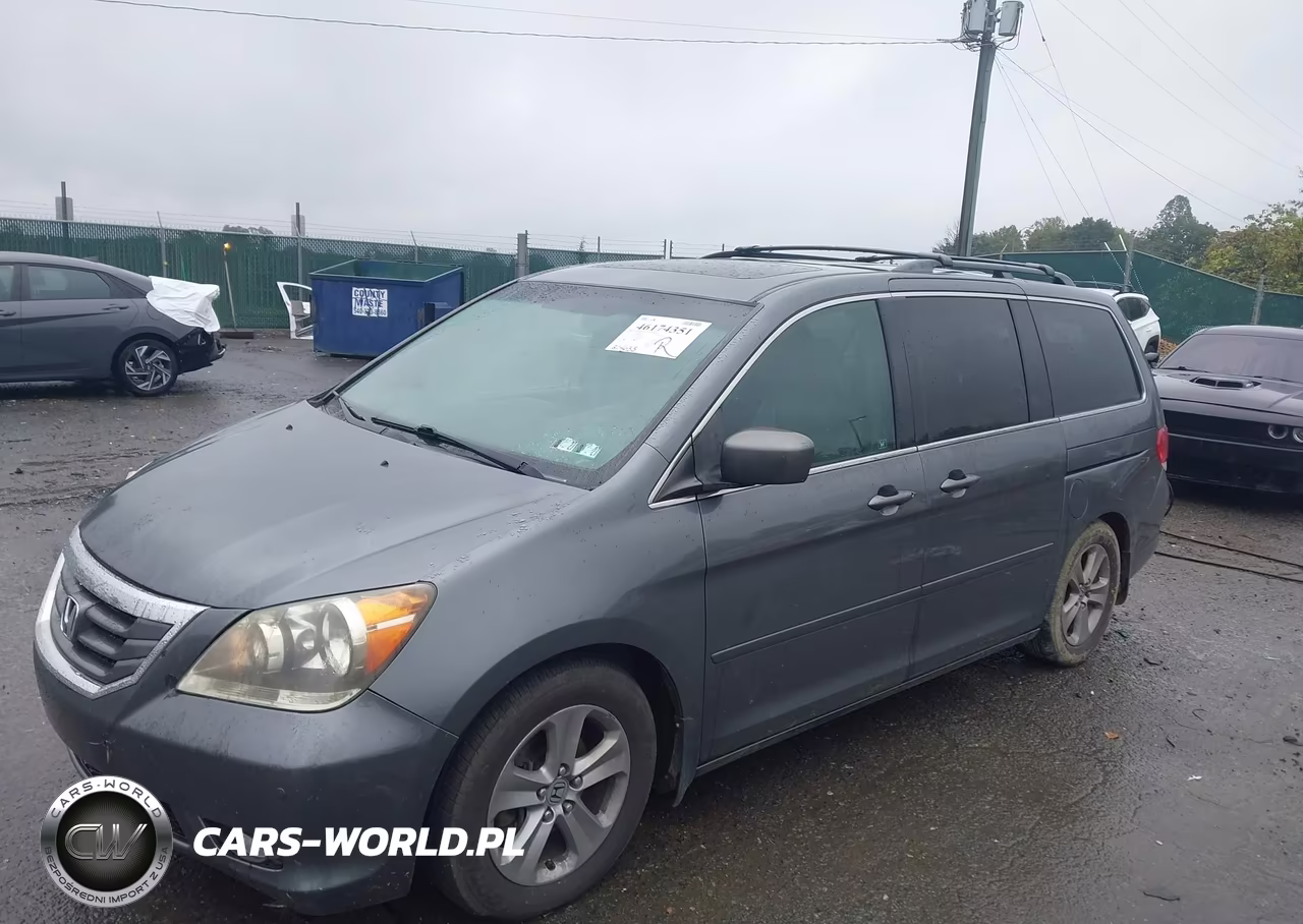 2010 Honda Odyssey Touring VIN:5FNRL3H91AB081676 - 2
