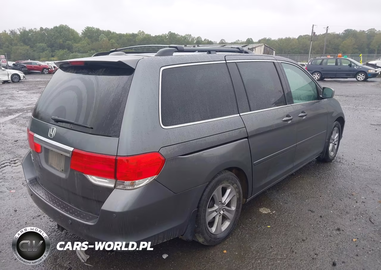 2010 Honda Odyssey Touring VIN:5FNRL3H91AB081676 - 4