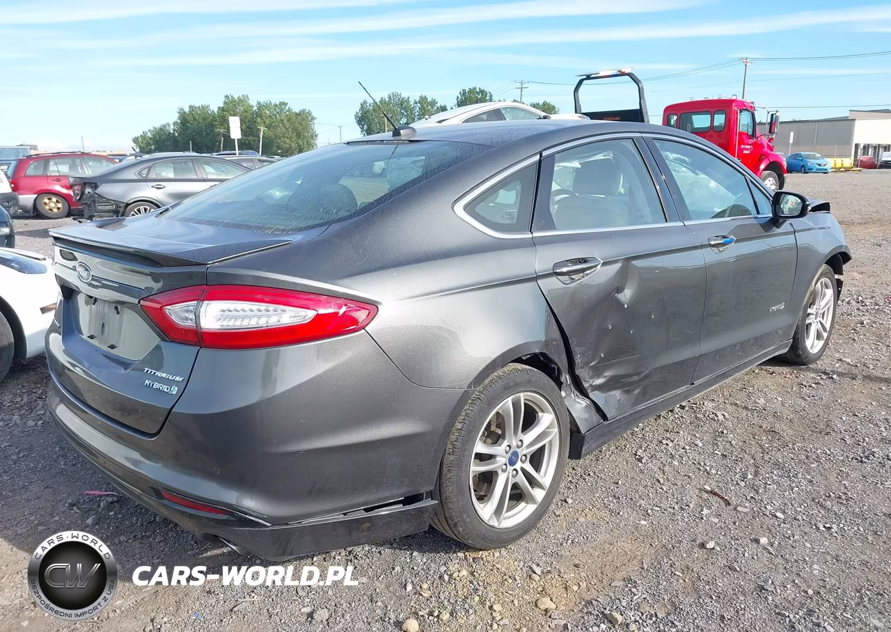 2016 Ford Fusion Hybrid Titanium VIN:3FA6P0RU4GR325200 - 4