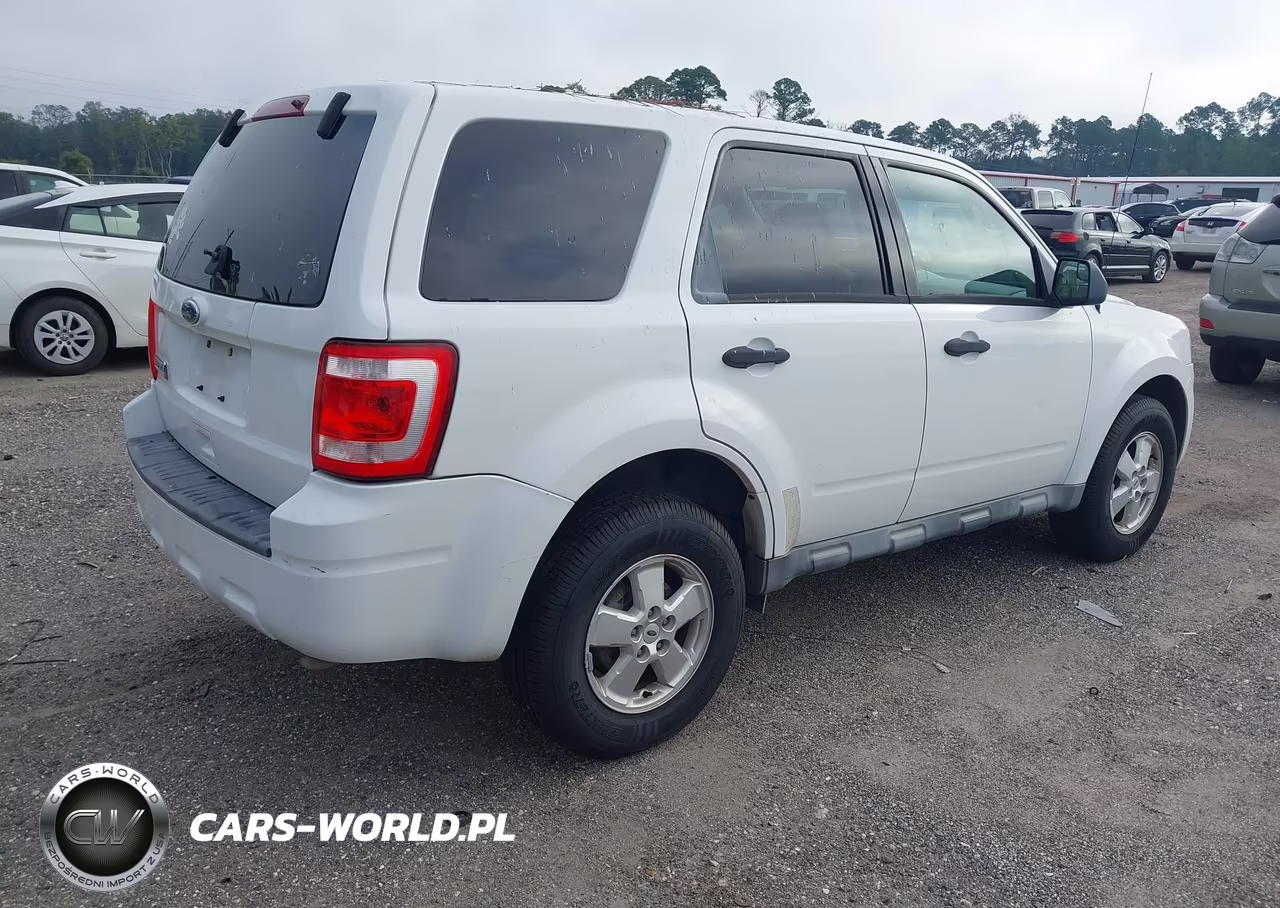 2010 Ford Escape Xls VIN:1FMCU0C76AKB00650 - 4