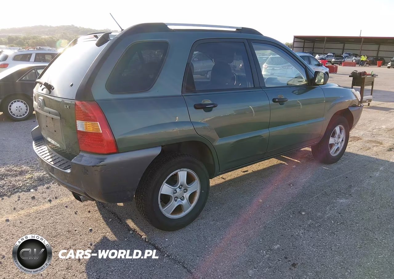 2007 Kia Sportage Lx VIN:KNDJF724X77384494 - 4