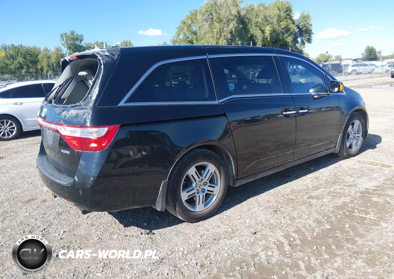 2011 Honda Odyssey Touring-Touring Elite VIN:5FNRL5H94BB037667 - 4
